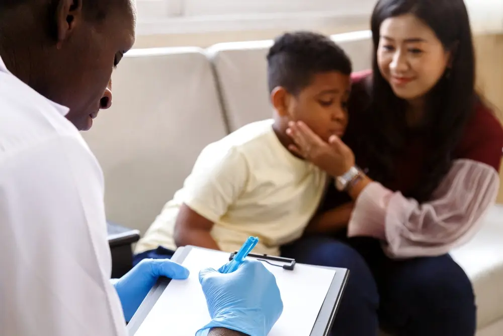Female doctor discussing non-medication ADHD treatment with a male patient