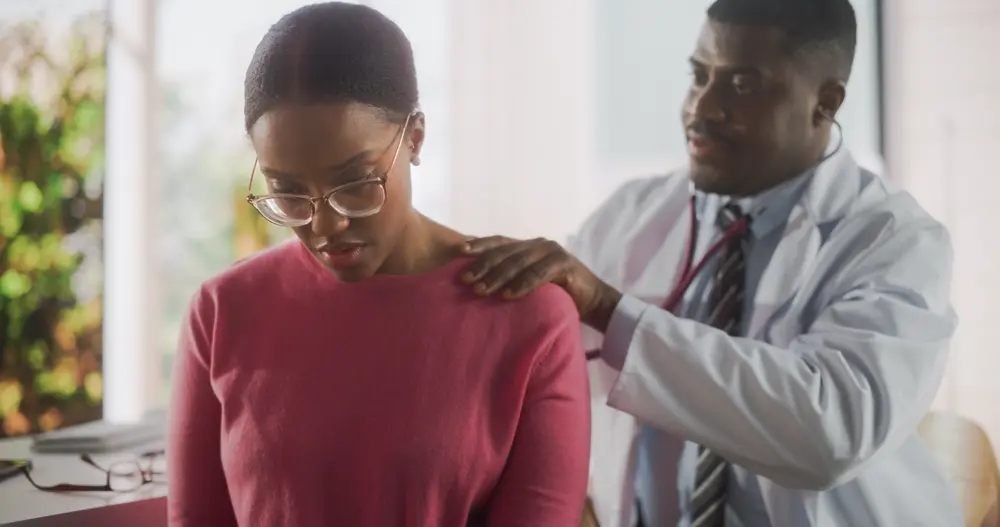 Two female doctors holding stethoscopes for adult primary care