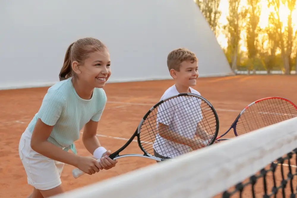 Teen athlete and parent meeting with a doctor for a youth sports physical in Royal Palm Beach