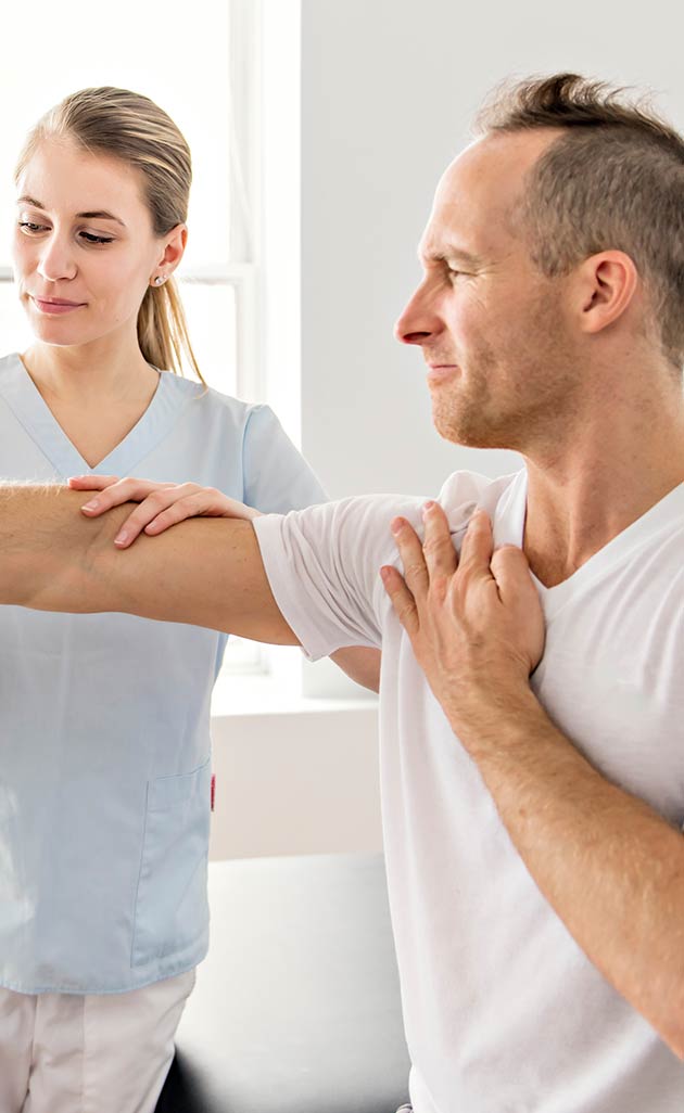 Nurse assisting a patient with B12 therapy