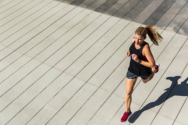 Woman jogging in workout clothes for medical weight loss and obesity treatment