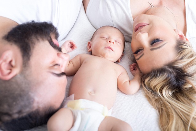 Parents and baby resting together for family healthcare