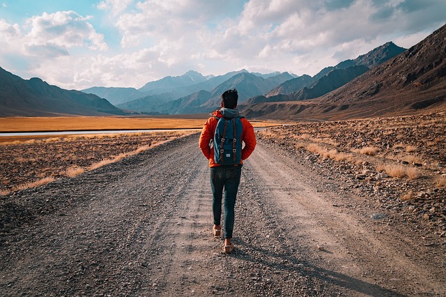 Man hiking on a rough trail representing testosterone wellness support